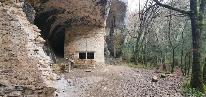 Image of a small Chapel dedicated to St.Michel build under a rock overhang at the ground of the Enesque Gorge in near Monieux, Southern France.