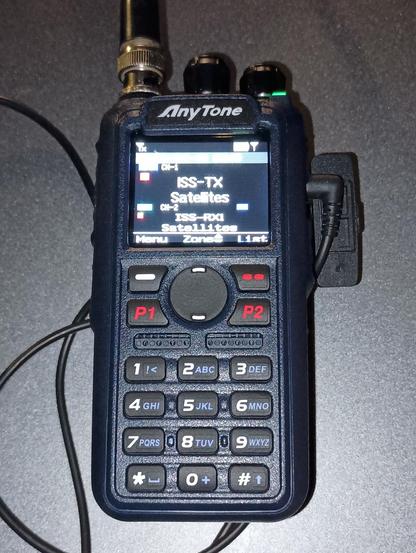 Closeup of WD9EWK's Anytone AT-D890UV handheld 2m/70cm FM/DMR transceiver, set up with memory channels in both VFOs before an ISS pass around 0810 UTC on 15 March 2026.